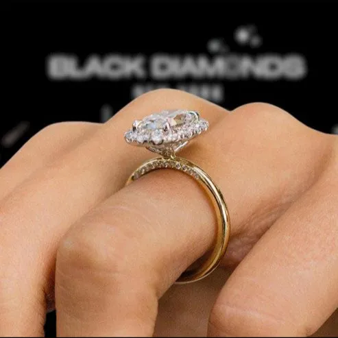 Elegant Yellow Gold Oval Cut Halo Engagement Ring